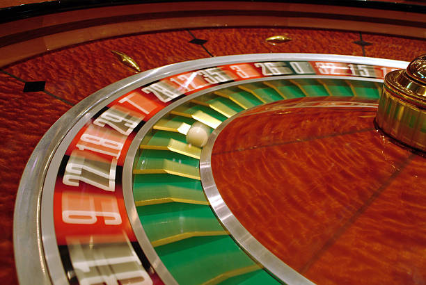 moga4d Auto Roulette studio with mechanical wheel, lighting rig, and camera equipment